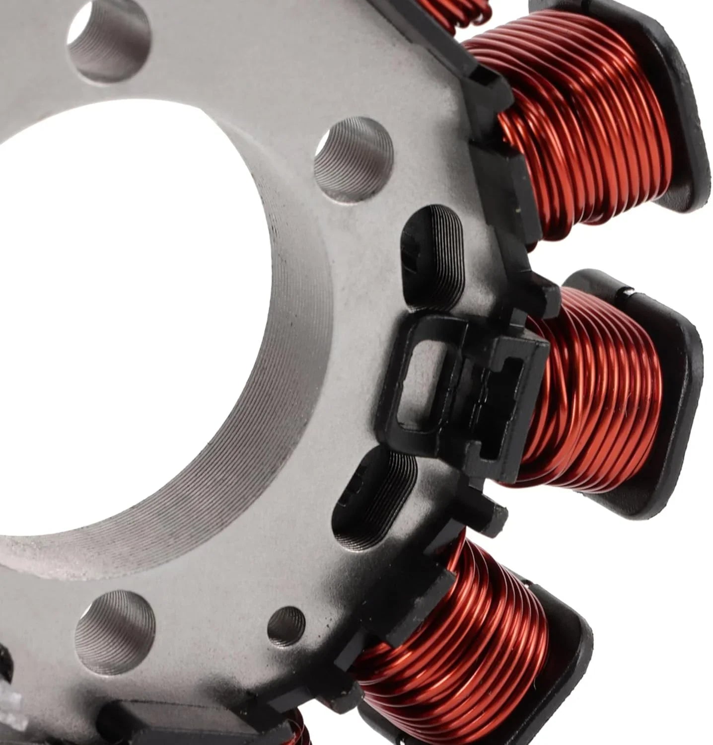 Close-up of Honda XR150L stator replacement with copper wire windings for motorcycle engine