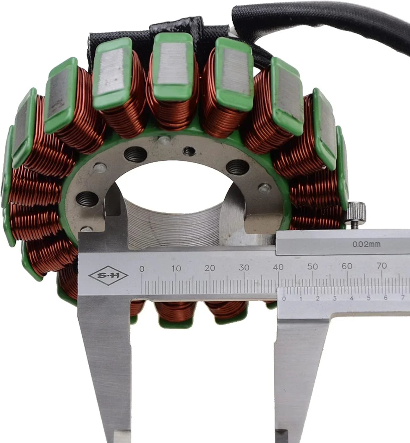 Yamaha XV250 magneto stator measured with caliper, copper coil windings visible