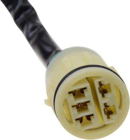 Close-up of motorcycle magneto stator wiring connector with six metal pins
