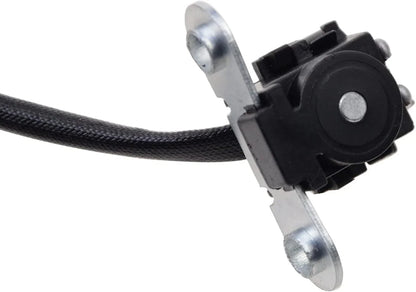 Close-up of a motorcycle stator magneto replacement part with mounting bracket and wire