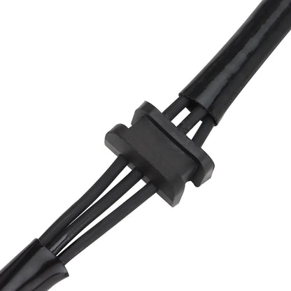 Close-up of black motorcycle stator wiring harness connector