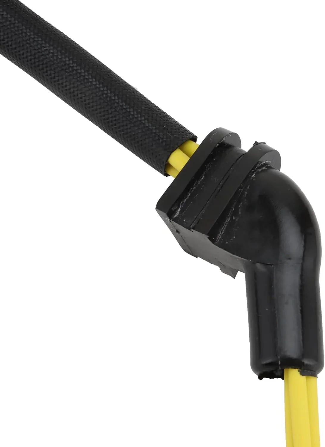Close-up of a motorcycle stator replacement wire with black protective sleeve and connector