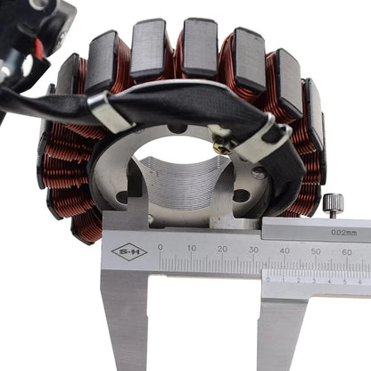 Close-up of a motorcycle stator magneto with caliper measuring diameter