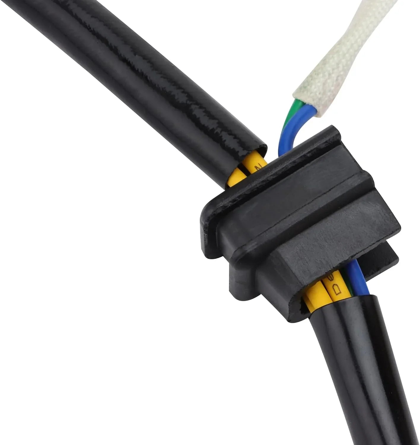 Close-up of ATV stator wiring harness with black connector and color-coded wires