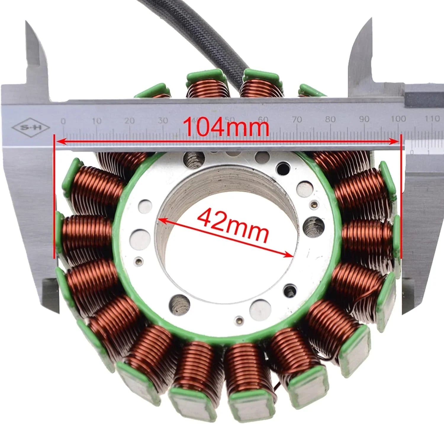 ATV stator replacement part measured with caliper, dimensions 104mm and 42mm shown.