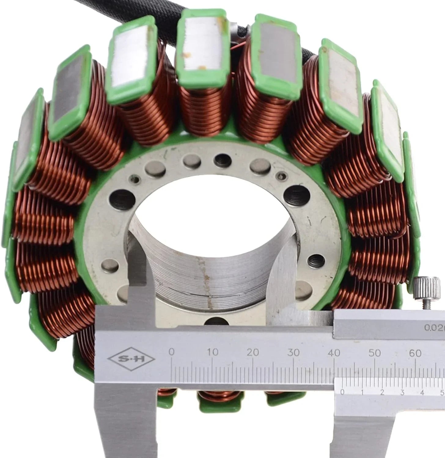 ATV stator replacement part with copper windings measured by caliper close-up