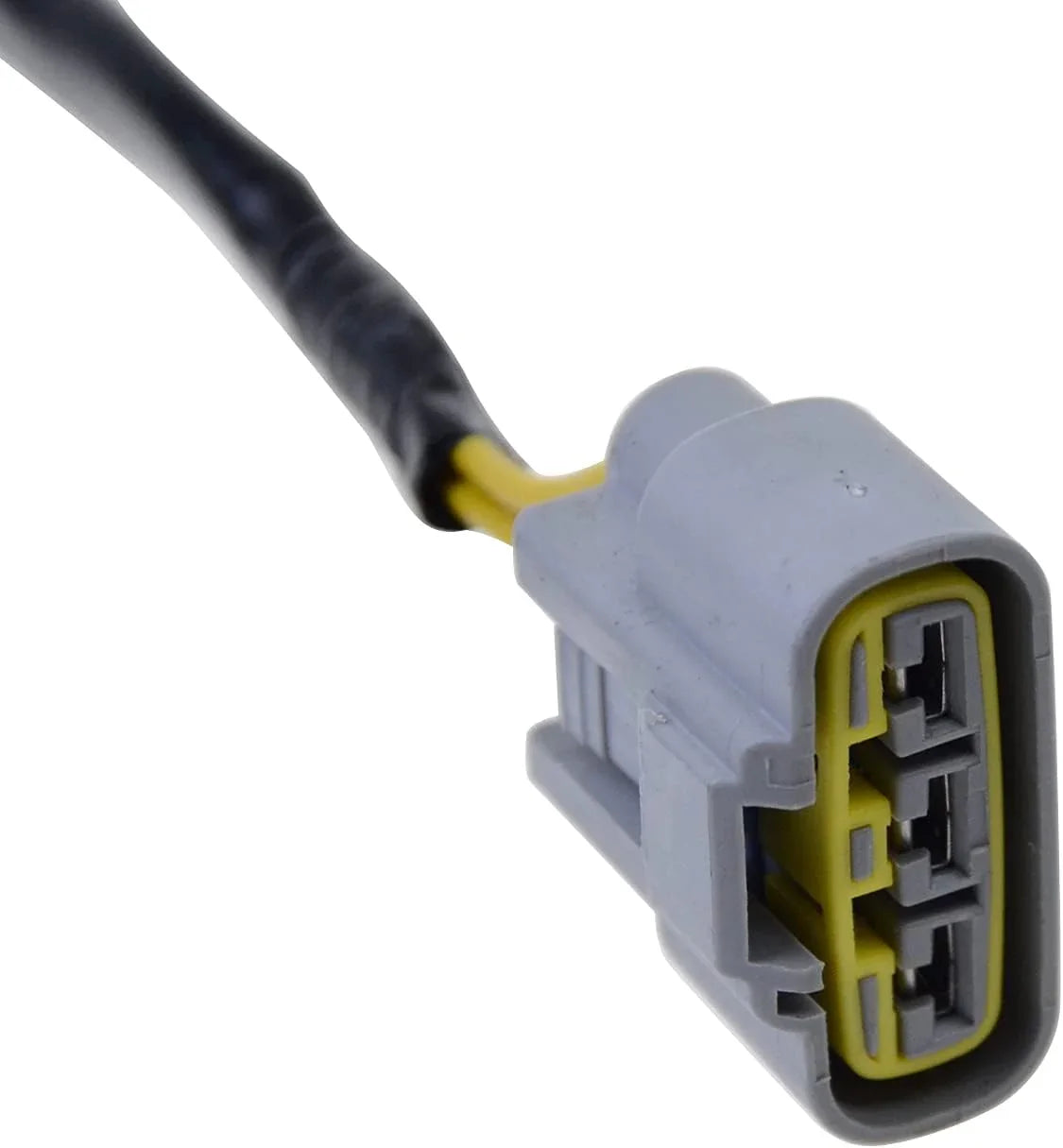 Close-up of a gray motorcycle stator connector plug with yellow and black wires