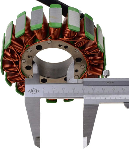 Motorcycle stator coil with copper windings measured by caliper on white background