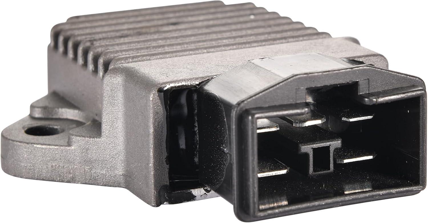 Close-up of a motorcycle regulator rectifier with metal fins and connector ports